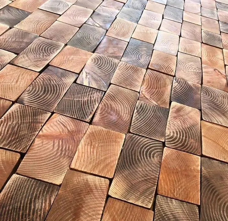 end grain wood block flooring close up showing tree ring concentric patterns natural wood