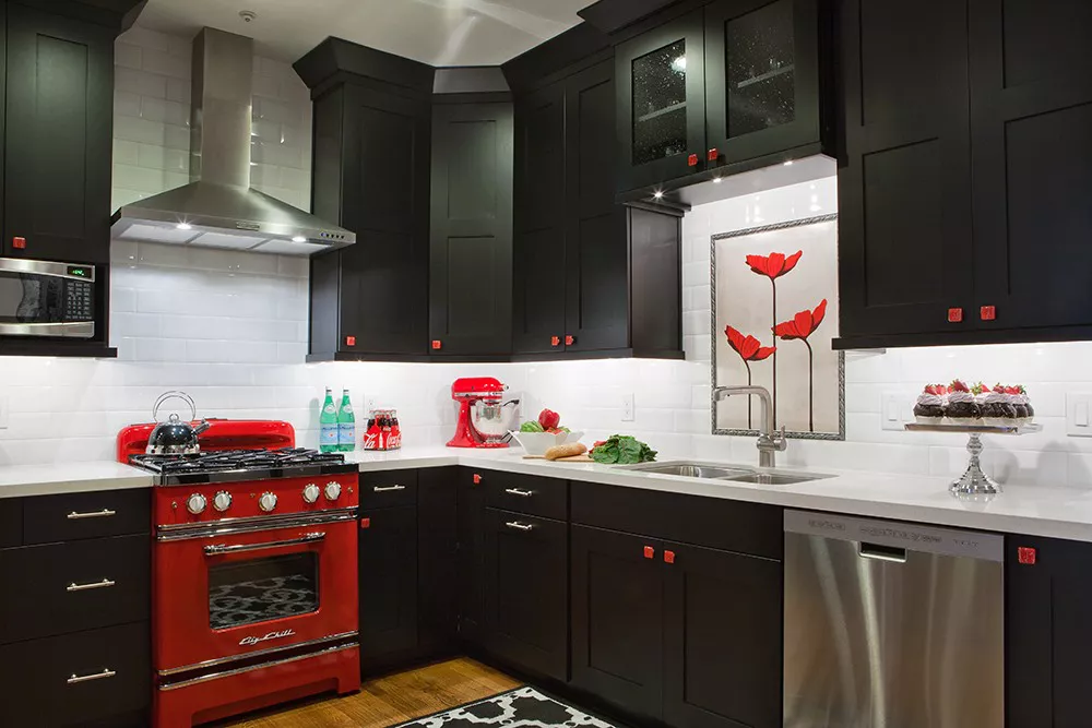 black kitchen cabinets with red hardare